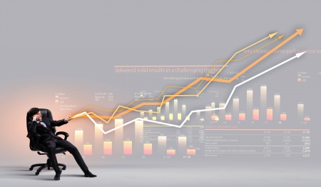Image of young businessman pulling graph  Chart growth conceptの写真素材