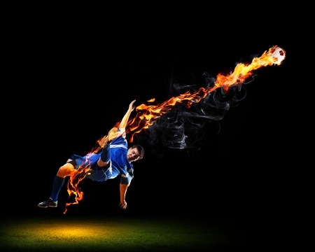 Image of football player in blue shirtの写真素材