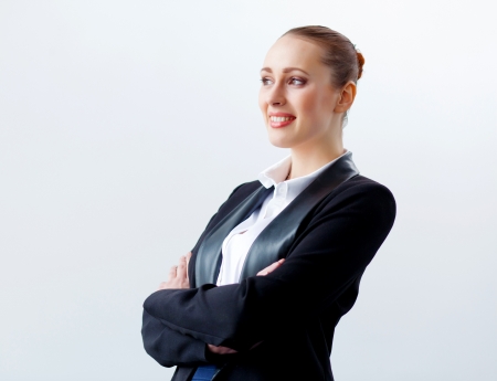 Image of young businesswoman in black suitの写真素材