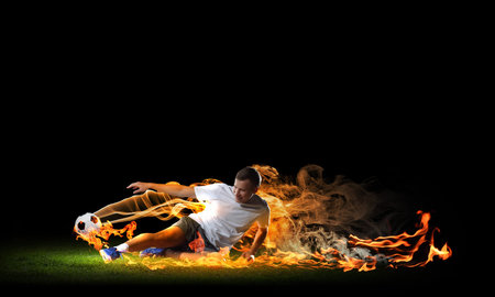 Image of football player in white shirtの写真素材