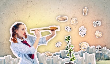 Image of young pretty woman looking in telescopeの写真素材