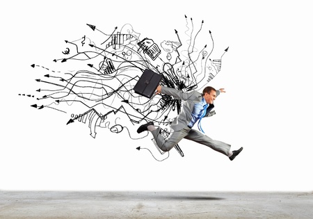 Image of businessman in jump against sketch backgroundの写真素材