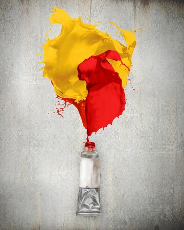 Image of paint tube with color splashesの写真素材