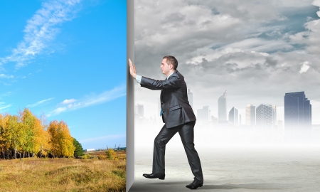 Image of young business man changing realityの写真素材