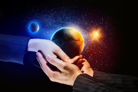 Close up image of human hands holding earth planer  Ecology conceptの写真素材