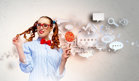 Image of funny lady in red glasses with lollipopの写真素材