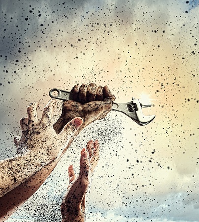 Close-up image of human hand holding wrench  Constructionの写真素材