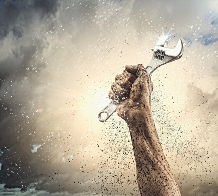 Close-up image of human hand holding wrench  Constructionの写真素材