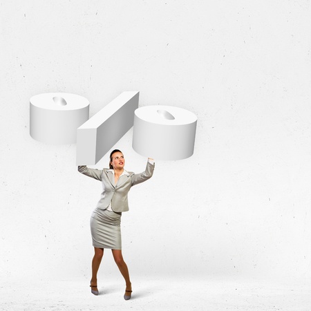 Image of businesswoman holding percentage symbol above headの写真素材