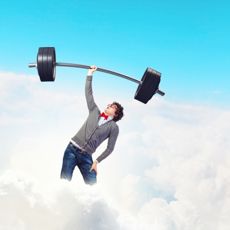 Weight Lifting businessman with a red tie  illustrationの写真素材