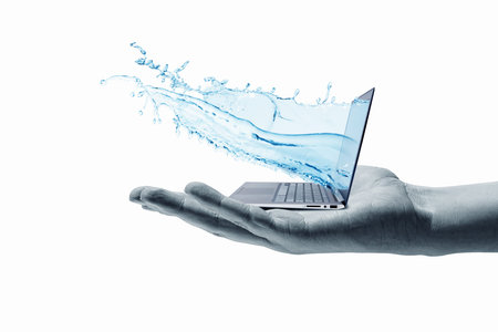 Image of laptop in human hand  Technology conceptの写真素材