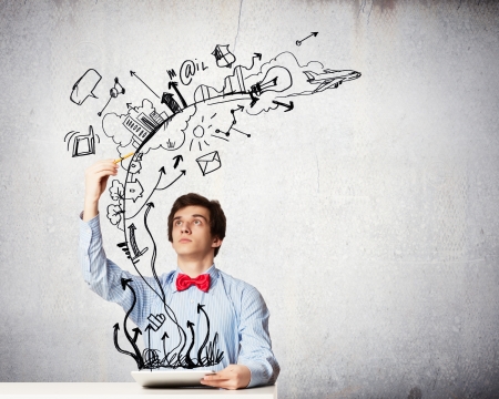 Young thoughtful man using laptop  Idea conceptの写真素材