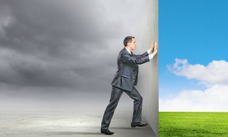 Image of young business man changing realityの写真素材