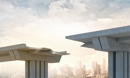 A gap in the concrete bridge ad a symbol of risk and dangerの写真素材