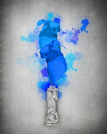 Image of paint tube with color splashesの写真素材