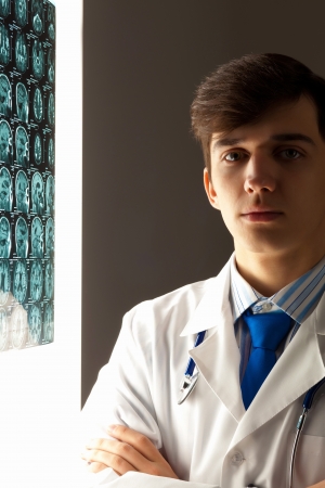 Image of male radiollogist with x-ray resultsの写真素材