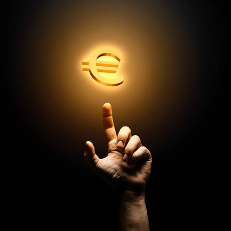 Human hand pointing at euro symbol  Banking conceptの写真素材