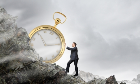 Image of young businessman and pocket watch  Time conceptの写真素材