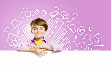 Image of little cute with blank banner against color backgroundの写真素材
