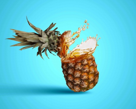 Image of fresh pineapple in juicy splashesの写真素材