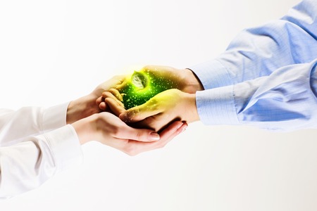 Green sprout in human hands  Recycle ideaの写真素材