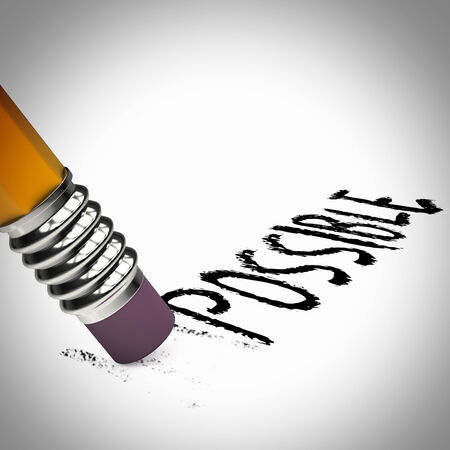 Pencil with rubber erasing characters of word impossibleの写真素材