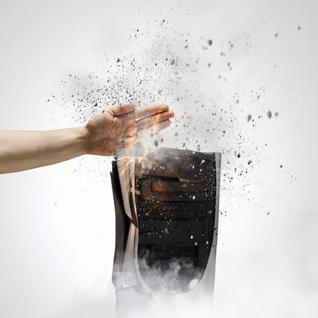 Close up image of human hand damaging computer processorの写真素材