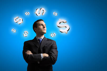 Image of confident businessman with arms crossed on chestの写真素材