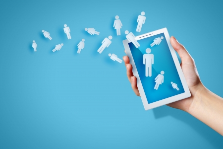 Close-up image of human hands holding smartphoneの写真素材