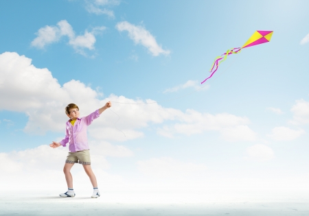 Little boy playing with kite  Childhood conceptの写真素材