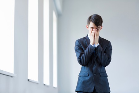 Image of upset businessman in business suitの写真素材