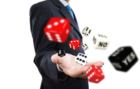 Close up of businessman throwing dice  Gambling concept