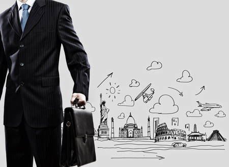 Businessman holding suitcase against sketch background  Business travelの写真素材