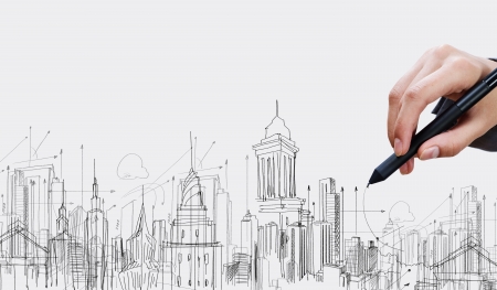 Close up of businesswoman hand drawing sketches with markerの写真素材