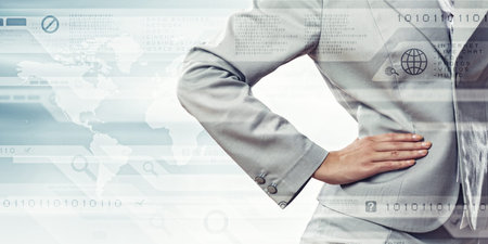 Businesswoman in suit against media map backgroundの写真素材