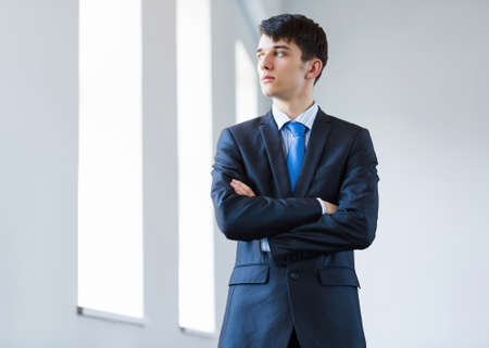 Image of handsome confident businessman in business suitの写真素材