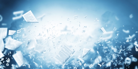 Background conceptual image with papers flying in airの写真素材