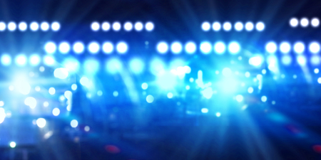 Background image of stage in color lightsの写真素材