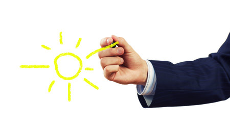 Close up of businessman drawing Earth planetの写真素材