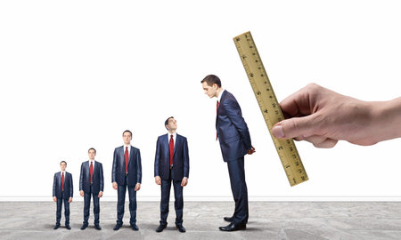 Successful confident businessmen standing in line  Progress in careerの写真素材