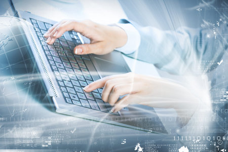 Close up image of businesswoman hands typing on keyboard