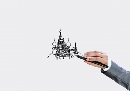 Close up of businesswoman hand drawing sketches with markerの写真素材