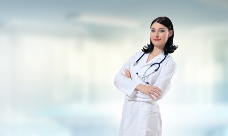 Young attractive woman doctor with stethoscope on neckの写真素材