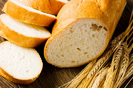 Fresh white sliced bread lying on table