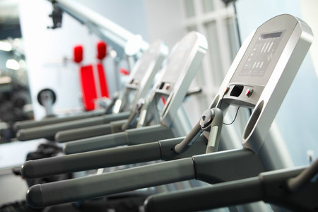 Image of treadmill in gym  Fitness and athletics
