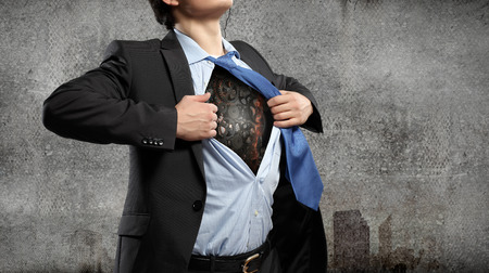 Close up of businessman acting like superheroの写真素材