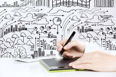 Close up of human hand drawing business strategy planの写真素材