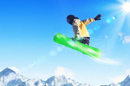 Man on snowboard jumping in sky  Summer vacationの写真素材