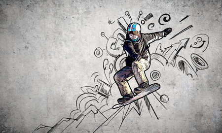 Close up of hand drawing sketches of snowboarderの写真素材