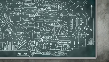 Background conceptual image with business sketches on chalkboardの写真素材